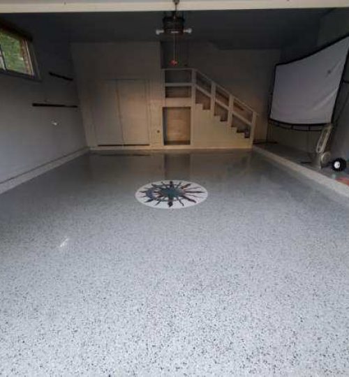 Flake Garage with Compass Inlay — epoxy in Fayetteville