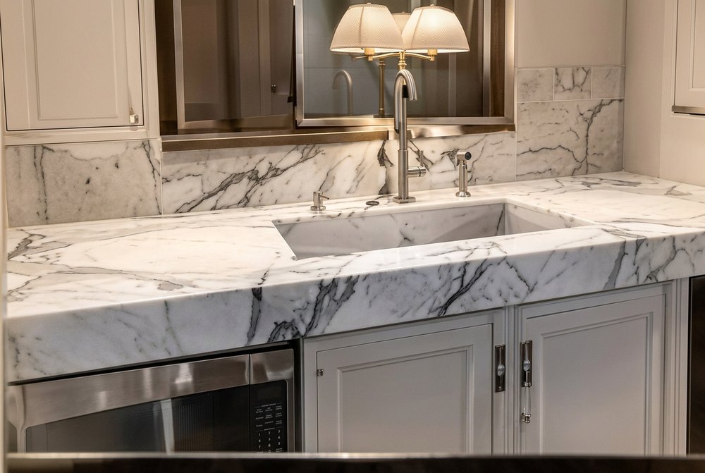 White marble epoxy kitchen countertop with waterfall edge